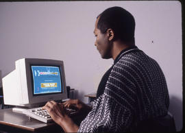 Photograph of a student doing work on the computer