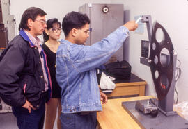Photograph of students testing equipment at the Canadian Plastics Training Centre