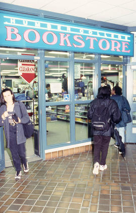 A photograph of students coming and going from the Bookstore