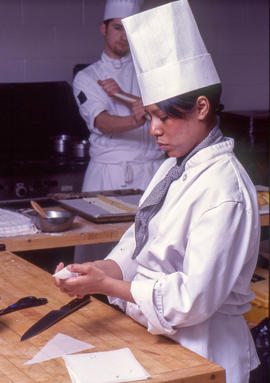 Photograph of culinary students at work in the kitchen