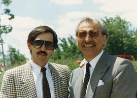 Photograph of Ian Smith, Al Michalek at  the President's faculty and staff barbecue