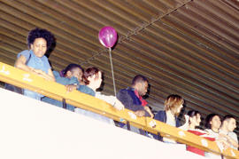 Photograph of students on the balcony overlooking the concourse