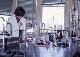 Photograph of a student doing an experiement in the chemistry lab