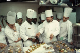 Photograph of faculty member Anthony Bevan and students