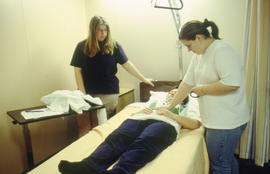 Photograph of nursing students practicing techniques