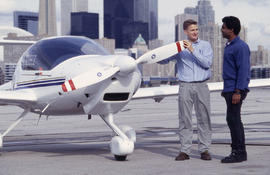 A photograph of Flight Aviation faculty member and student