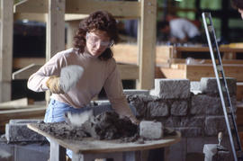 Photograph of a Landscaping student constructing a garden display