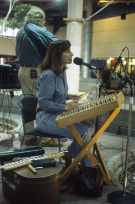 Photograph of a couple engaged in a musical performance