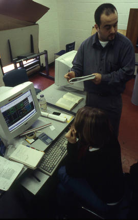 Photograph of students working on assignments