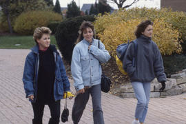 Photographs of students on walkway at main entrance