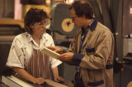 Photograph of an instructor and student in the Woodworking shop