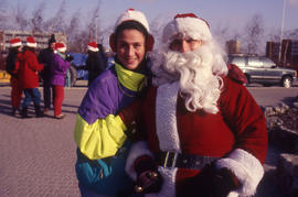 Photograph of Someone Next to Santa Claus