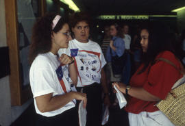 Photograph of Volunteers Talking to People During Orientation