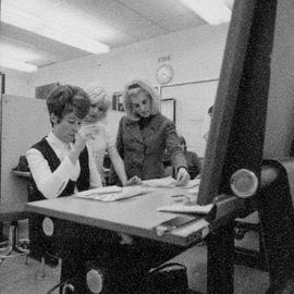 Photograph of Interior Design Students Developing Designs at the Drafting Tables