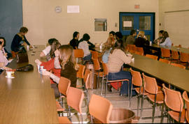 Photograph of students and staff in cafeteria