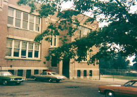 Photograph of the James S. Bell Elementary School building and parking lot