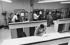 Photograph of Students using Pneumatic Equipment in the Lab
