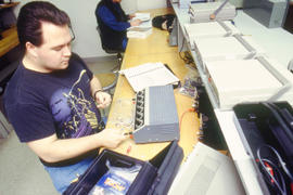 Photograph of a student in the Electronics program