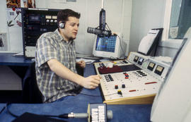 Photograph of student in Humber radio broadcasting studio