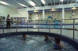Photograph of persons using the whirlpool hot-tub