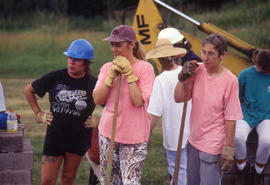 Photograph of groundskeeping crew ready to get to work