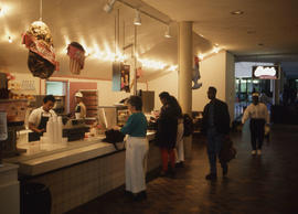 Photograph of patrons ordering treats at Swirls Frozen Yogurt & Ice Cream