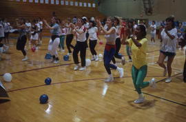 Photograph of a group of persons exercising