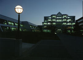 Photograph of the main entrance to campus in the evening