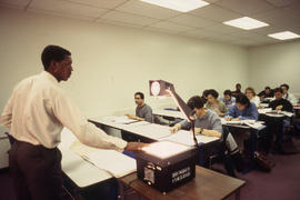 A photograph of a professor giving a lecture