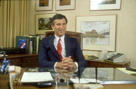 Photograph of Robert Gordon Sitting at His Desk