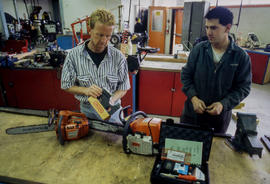 Photograph of Robert Smith working with student