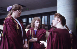 Photograph of Graduates Talking at Convocation
