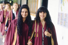 Photograph of Graduates Walking Down the Hall