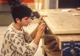 Photograph of a student the Cabinetmaking/Woodworking lab