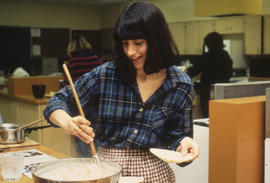 Photograph of a Student Baking in the Lab