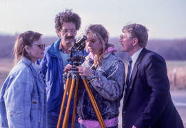 Photograph of a Faculty Engineering students learning to use a survey transit