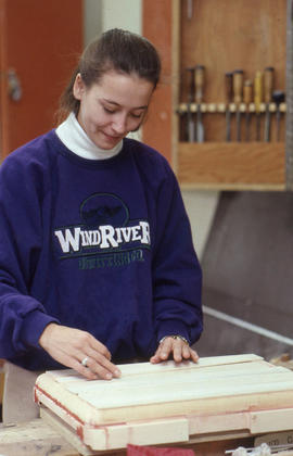 Photograph of a student completing an assignment in the Industrial Design workshop