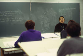 Photograph of a faculty member teaching students from the Design Foundations programme