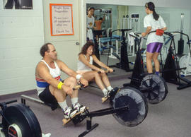 Photograph of Fitness Centre users on various fitness equipment