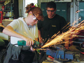 Photograph of a staff member welding