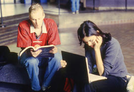 Photograph of students studying in the concourse
