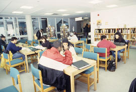 A photograph of studious students in the Quiet Study area of the Library