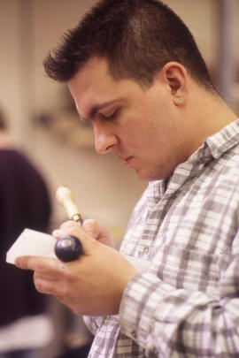 Photograph of a student in the Cabinetmaking/Woodworking lab