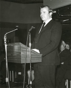 Photograph of William Davis talking on a podium
