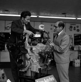 Photograph of Al Raskin and Stan Keith talking