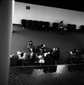 Photograph of students sitting and talking in the student lounge