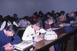 Photograph of students completing a questionnaire