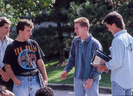 Photograph of students in a group sharing a laugh