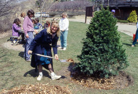 Photograph of Maureen Wager and other staff at an  Earth Day event