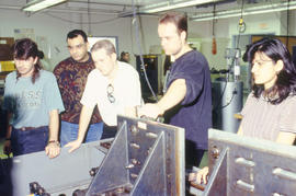 Photograph of students in the mechanical Engineering Engineering lab